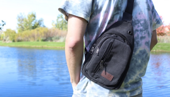 Picture 3 of Unisex Canvas Crossbody Sling Bag for Travel, Day Trips, and Commuting